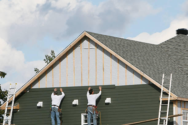 Professional Siding Repair technician working in Exmore, VA
